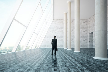 Businessman standing in interior