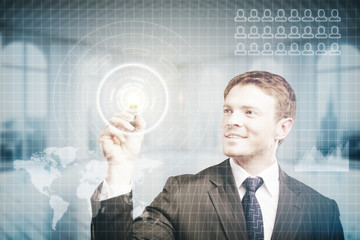 Happy businessman pressing virtual buttons
