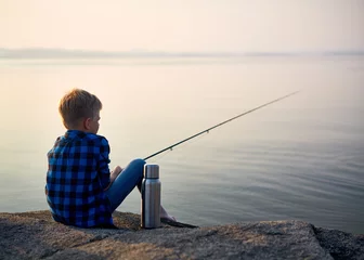 Zelfklevend Fotobehang Boy fishing © pressmaster