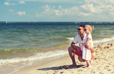 happy family in sunglasses on summer beach