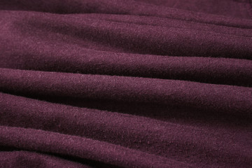 A full page of ripples of soft red fleece fabric texture