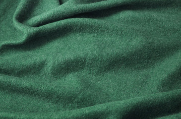 A full page of fluffy green fleece fabric texture