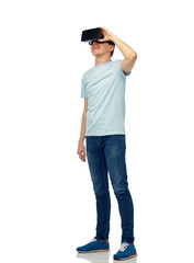happy man in virtual reality headset or 3d glasses
