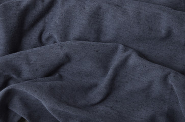 A full page of grey marl fabric texture