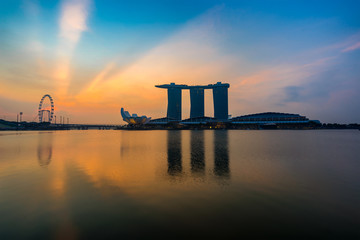 Naklejka premium Singapore,Singapore – April 2016 : Aerial view of Singapore city skyline in sunrise or sunset at Marina Bay, Singapore