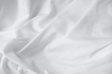 Obraz premium A full page of soft white creased comforter texture