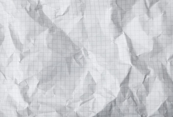 A full page of creased white squared paper texture