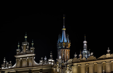 details on main square of cracow at night