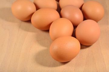 Fresh brown eggs close-up on