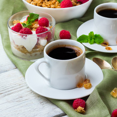 Breakfast concept. Coffee muesli granola berries homemade yogurt