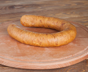 Home sausage on a wooden board