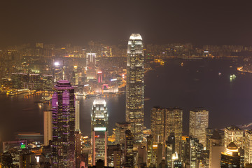 Fototapeta na wymiar Hong Kong city skyline panorama at night with Victoria Harbor an