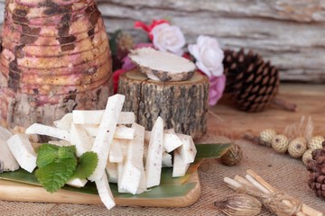 Fresh taro and taro sliced for cooking.