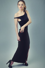 Fashion photo of beautiful lady in elegant evening dress