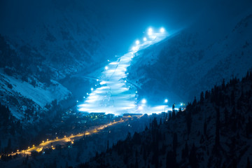 Night Road by mountain ski resort Chimbulak in Almaty, Kazakhstan 