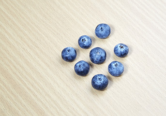 blueberries on wooden table