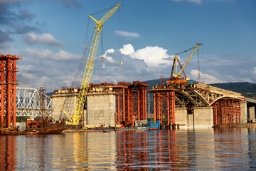 Construction of a new road bridge across the Yenisei River in Krasnoyarsk, Russia