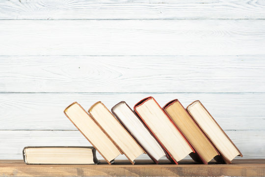 Stack of colorful books. Education background. Back to school. Copy space for text.