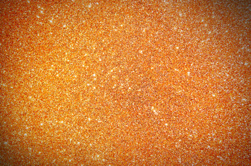 Glitter orange halloween texture background.