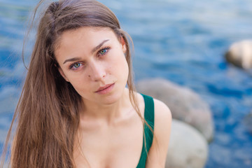 beautiful sad girl with green eyes