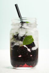 Infused water with fresh organic mulberry and mint