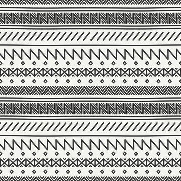 Tribal hand drawn line geometric mexican ethnic seamless pattern. Border. Wrapping paper. Scrapbook. Doodles. Vintage tiling. Handmade native vector illustration. Aztec background. Ink graphic texture