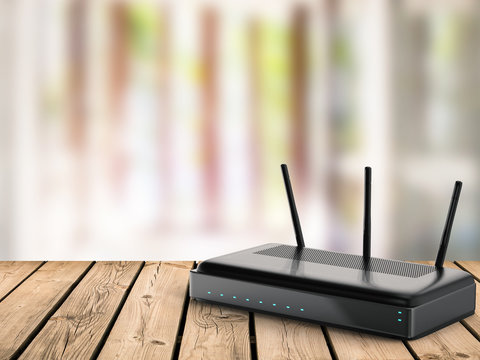 black router on wooden table
