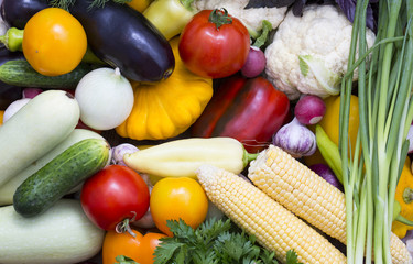 Background of fresh vegetables and greens closeup