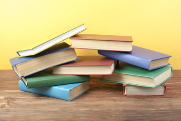 Stack of colorful books. Education background. Back to school. Copy space for text.