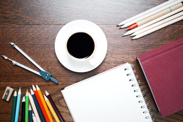 Desktop with coffee and supplies