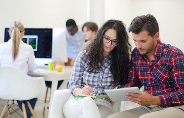 business couple working together on project at modern startup office