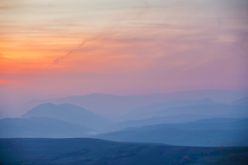 November misty sunset in Carpathian mountains