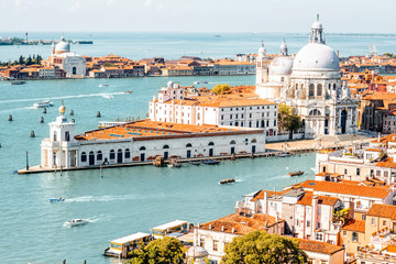 Aerial cityscape view on Venice old town with Santa Maria basilica at the sunny day