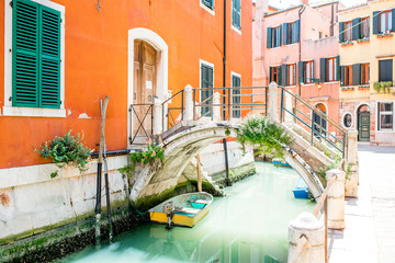 Small romantic water canal in Castello region in Venice