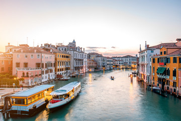 View on illuminated Grand canal with from Accademic bridge at the dusk in Venice.