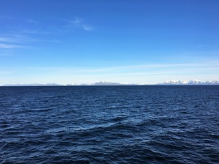 Obraz premium The coast outside Bodo, Norway. The coast here is known for its steep mountains and islands, many of them are over 500-metres above sea level.