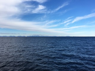 Obraz premium The coast outside Bodo, Norway. The coast here is known for its steep mountains and islands, many of them are over 500-metres above sea level.