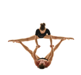Acrobatics. Man and woman doing splits in support