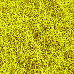Yellow weaved and porous texture.Abstract background.