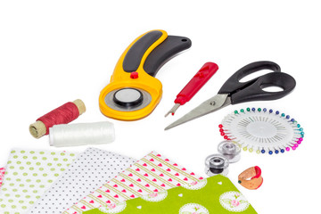 Composition of instruments, items and fabrics for patchwork and