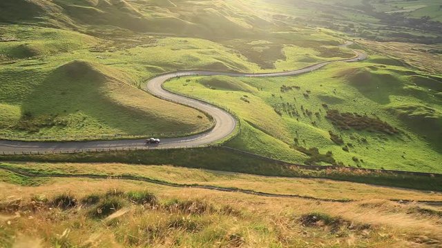 Curvy Countryside Road at Sunset in Peak District UK