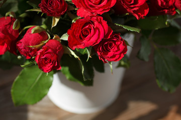 The bouquet of red roses in a vase