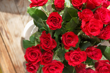 The bouquet of red roses in a vase