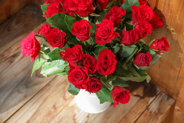 The bouquet of red roses in a vase