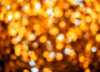 Obraz premium Holiday blurred bokeh golden color.