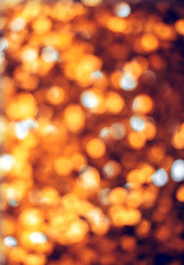 Holiday blurred bokeh golden color.Vertical Holiday background.