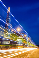 Shard skyscraper at night seen through traffic lights. London, The United Kingdom © maxterram