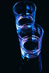 drinking glasses close-up on a dark background