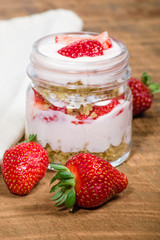 Oatmeal parfait with strawberries and cream