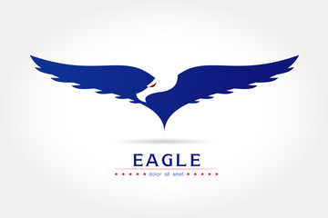 Graceful eagle silhouette logo